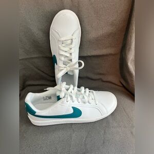 Nike size 9 white with teal swoosh.  EUC
